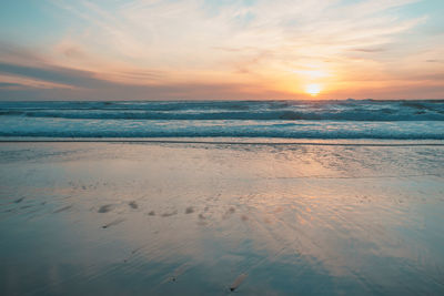 Scenic view of sea against sky during sunset