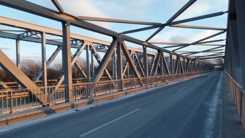 Bridge against sky in city