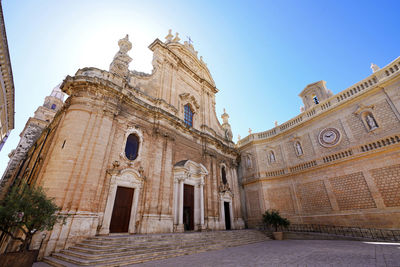 Monopoli cathedral with historic wall of the city, apulia, italy. wide angle.