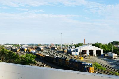 High angle view of train against sky in city