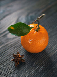 Close-up of orange fruit on wood