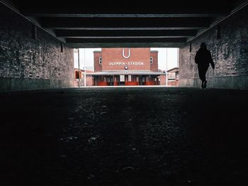 Full length of woman in tunnel