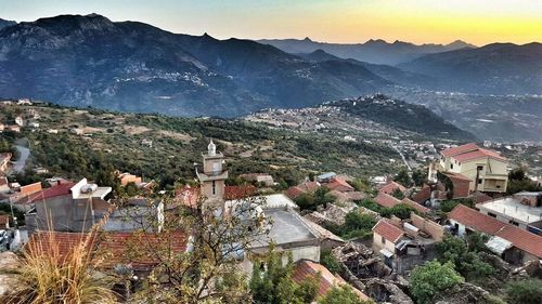 High angle view of town against mountains