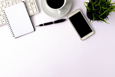 Directly above shot of coffee cup on table