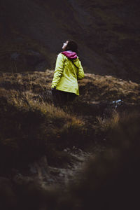 Rear view of woman with umbrella