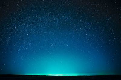 Scenic view of star field against sky at night