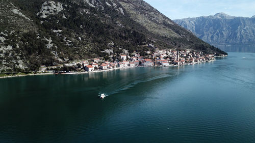 Scenic view of sea against mountains