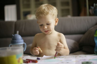 Portrait of boy at home