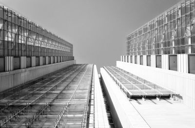 Low angle view of modern buildings against clear sky