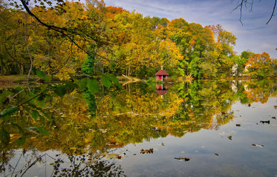 Scenic view of lake against sky during autumn