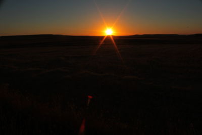 Scenic view of sunset over landscape