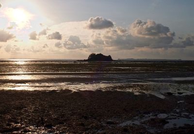 Scenic view of sea at sunset
