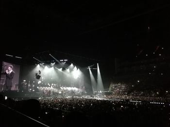 Crowd at music concert at night