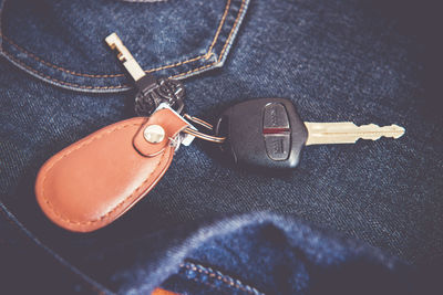 Car key on jeans texture background
