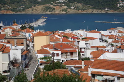 High angle view of townscape by sea