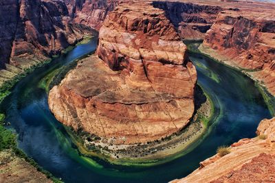 High angle view of river flowing through rock formations