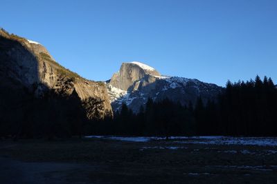 Snow covered mountain against clear sky