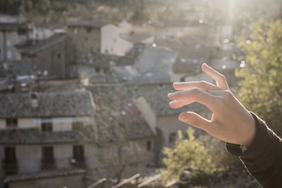 Person hand holding cigarette