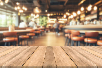 Close-up of wooden table in restaurant