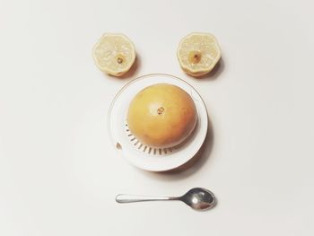 High angle view of tea on table against white background