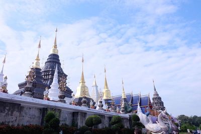 Panoramic view of temple building against sky