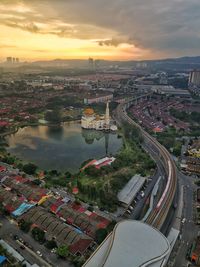 High angle view of cityscape against sky during sunset