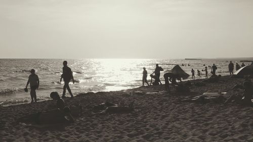 Silhouette of people on beach