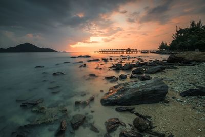 Scenic view of sea against sky during sunset