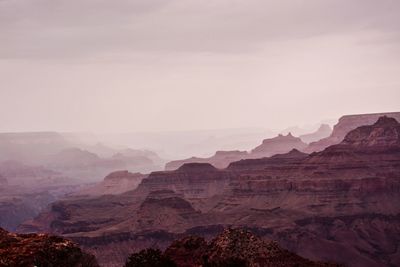 View of mountain range against cloudy sky