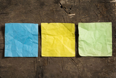 Directly above shot of yellow paper on table