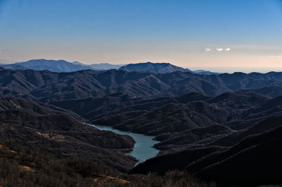 Scenic view of mountains against sky during sunset