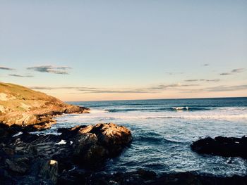 Scenic view of sea against sky during sunset