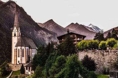 Panoramic view of trees and mountains against clear sky