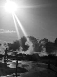 Sun shining over sea