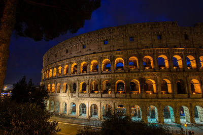 Low angle view of historical building against sky at night