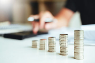 Close-up of coins on table