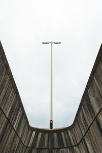 Low angle view of street light against sky