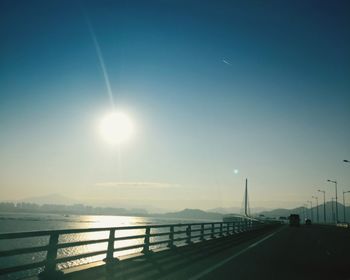 Bridge over road against sky