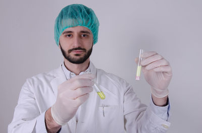 Portrait of man holding ice cream