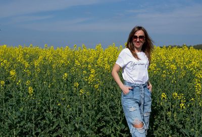 Full length of girl standing on field