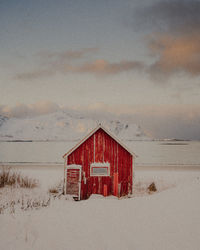 House on field against sky