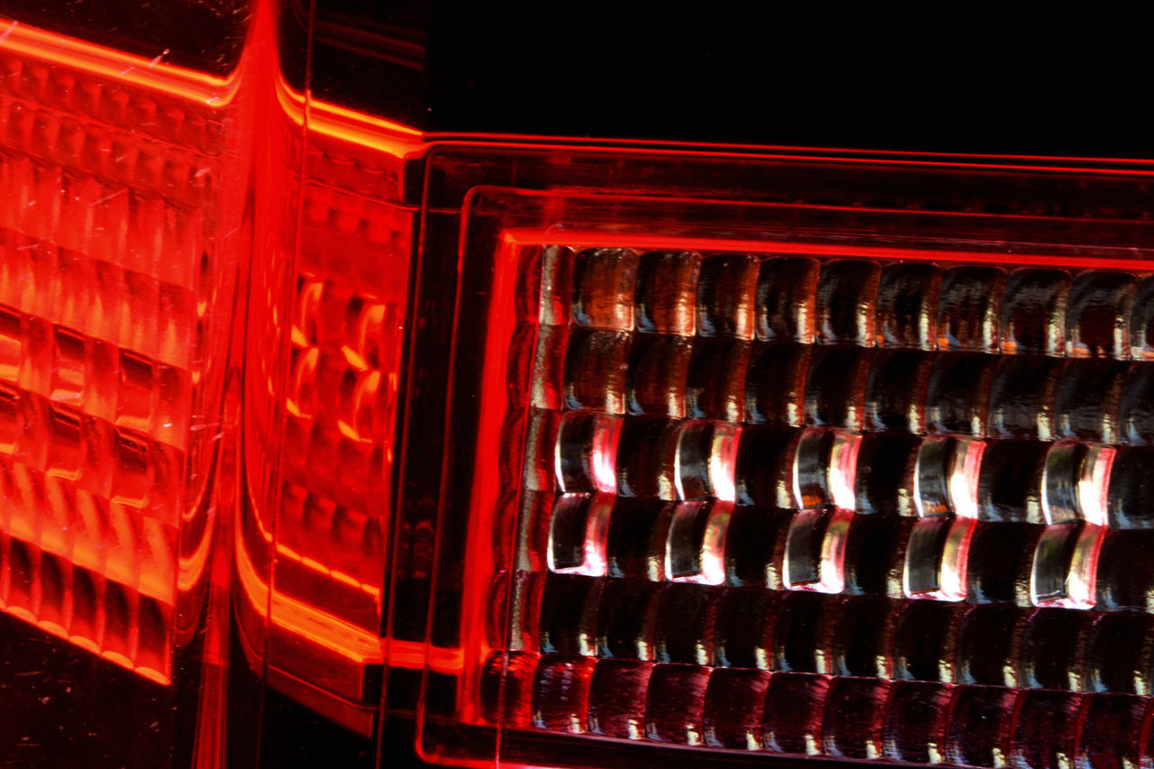 FULL FRAME SHOT OF ILLUMINATED MACHINE AT DUSK