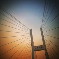 Suspension bridge at sunset