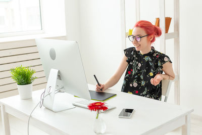 Woman working on table