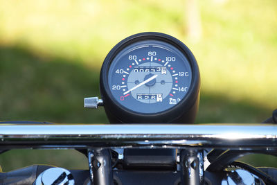Close-up of speedometer on motorcycle