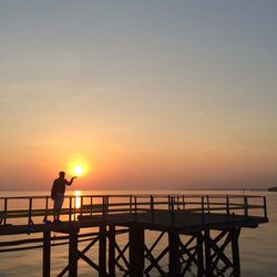 Scenic view of sea at sunset