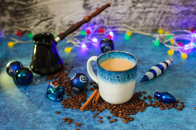 High angle view of coffee served on table