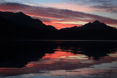 Scenic view of lake during sunset