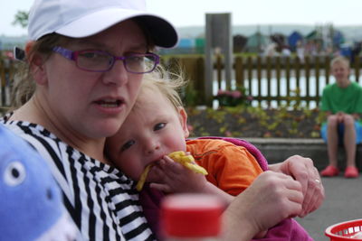 Close-up of girl eating food