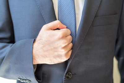 Close-up of man wearing suit